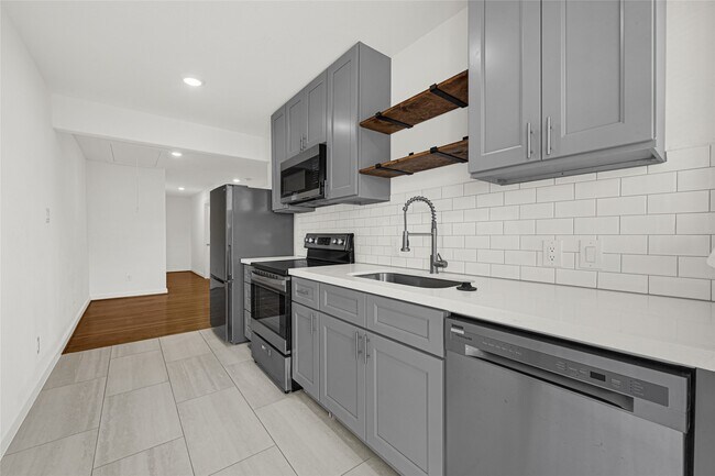 Building Photo - 6620 Lawndale St Unit 3