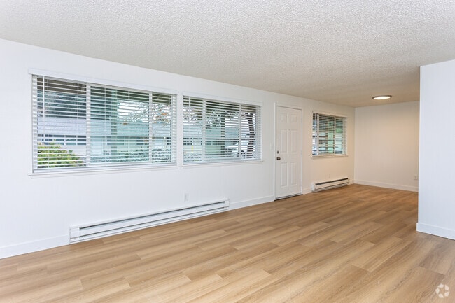 2BR, 1BA - 720SF - Living Room - Timberwood Court