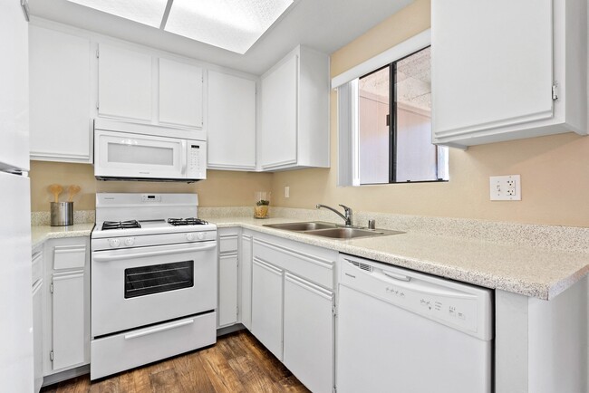 Kitchen with dishwasher at River Oaks in Oceanside, CA - River Oaks