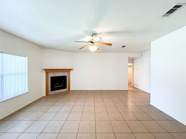 Photo - Available NOW!!!! Open floor plan features living room with fireplace, dining area, and large kit...