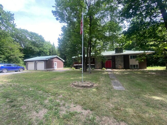Secluded 4 bedrooms 3 baths with 2 car garage and fenced in yard in the town of Rutland for rent!