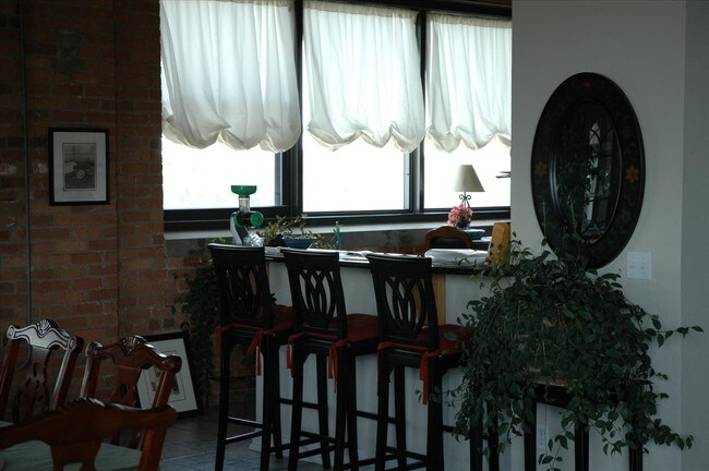 Breakfast nook with river views - 110 Ottawa St Condo Unit 5a