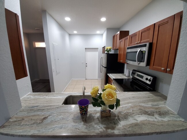 Kitchen access to garage door - 197 NW Eller St