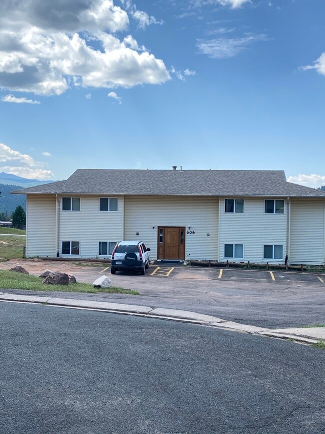 Front Entry and Parking Area.