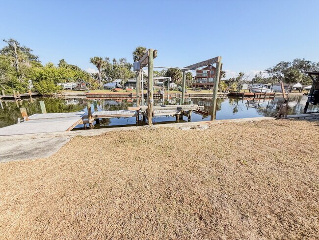 Photo - WATERFRONT POOL HOME ON A CANAL THAT LEADS STRAIGHT INTO TAMPA BAY - NEW DOCK AND SEAWALL COMING ...