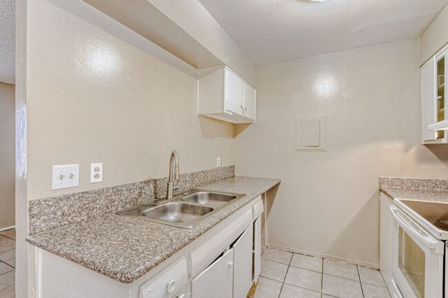 Photo - Spacious 2-Bed, 1-Bath with Open Concept & Natural Light
