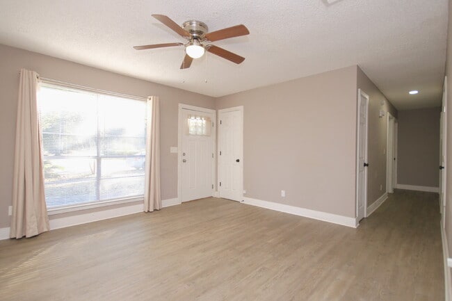 Photo - Beautifully Renovated 3-Bed, 1.5-Bath Home with Screened Porch in Desirable Pace Location