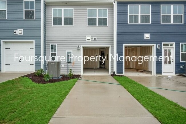 Spacious 3-Bed / 2.5-Bath Townhome with First-Floor Den, Hardwood Floors & 1-Car Garage – Wendell...