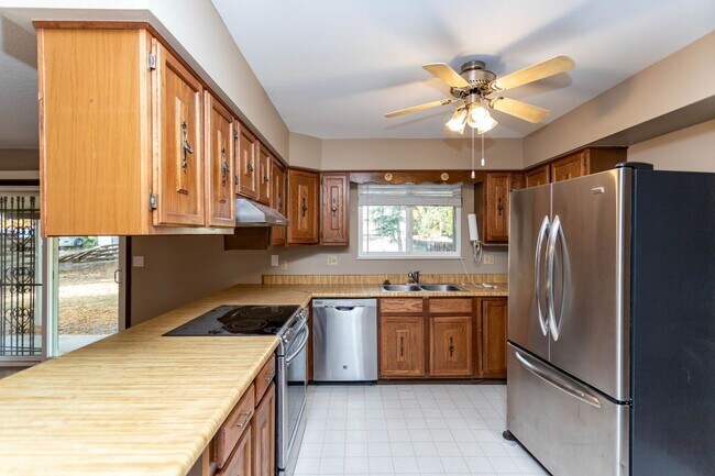 Photo - Comfortable Ranch-Style Living with Large Fenced Backyard!