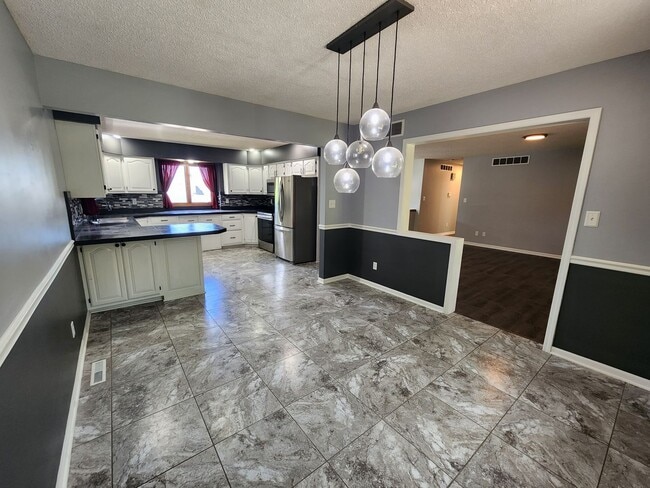 Photo - 2-Car Garage + Washer & Dryer + Recently Updated! Available September 3rd!