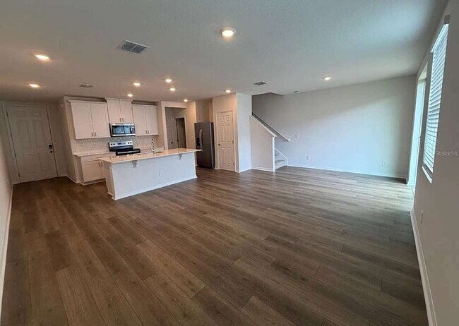 Photo - "Spacious 3-Bedroom Townhouse with Granite Elegance in St. Cloud – 4543 Rangeland Way"