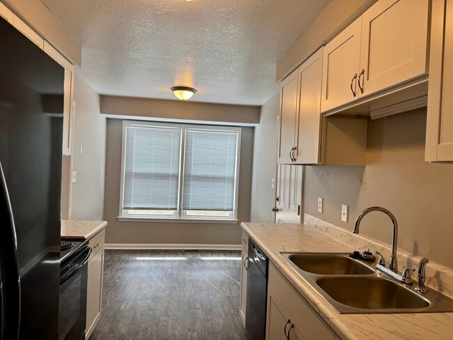 Photo - Charming 3-bedroom, 2-bathroom house with 1 Car Garage!