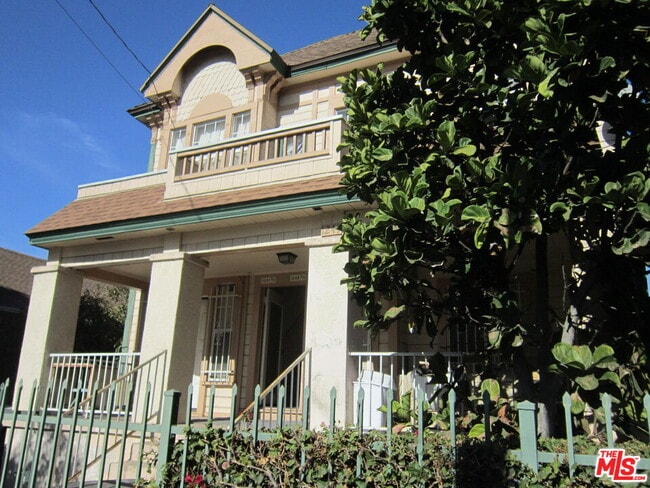 Building Photo - 1249 W 25th St Unit 1251 1/2