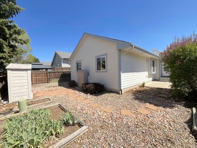 Photo - 4 Bedroom Home Available Near Research Pkwy & Scarborough Dr!