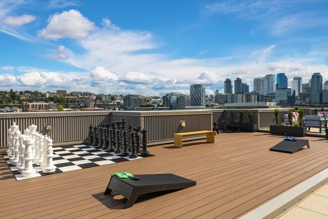 Rooftop terrace with views of Seattle cityscape