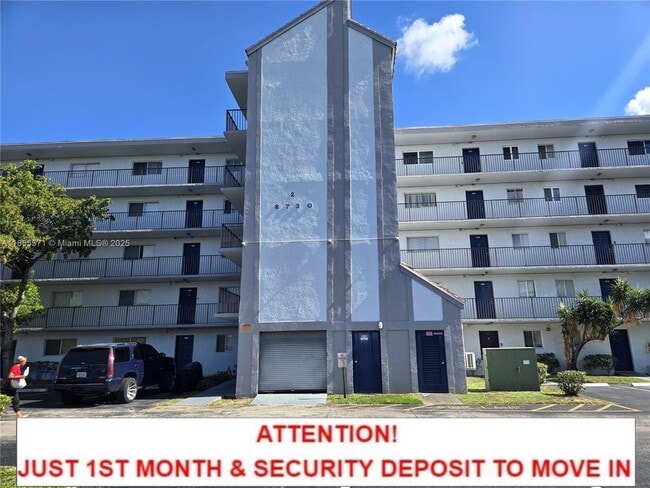Building Photo - 8730 N Sherman Cir Unit 108 Rental