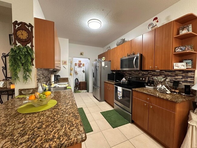 Building Photo - 3545 Forest Hill Blvd Unit 12
