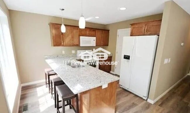 Photo - 1305 Flag Ave N Unidad 2  Low