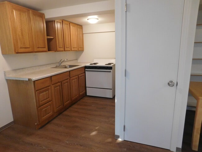Kitchen and Entry Closet at Right - 335 NE Kamiaken St Unit C4
