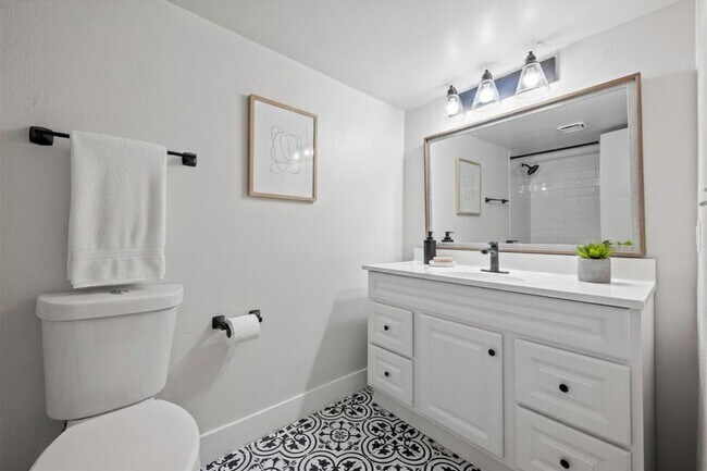 Photo - Updated 1 Bed Condo | Reserved Parking, Covered Patio & Fireplace Unit 129