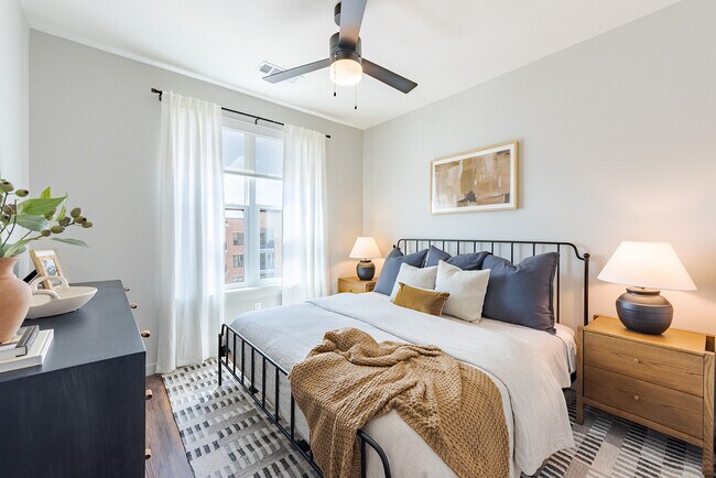 Cozy Primary Bedroom - Tisdale at Lakeline Station Apartments