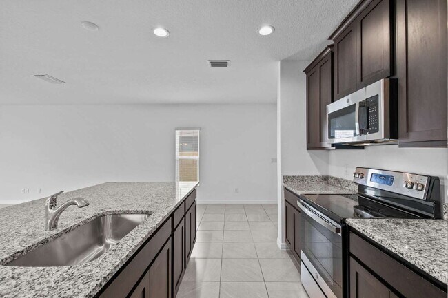 Photo - Spacious 4-Bedroom Home with Loft, Office & Private Backyard