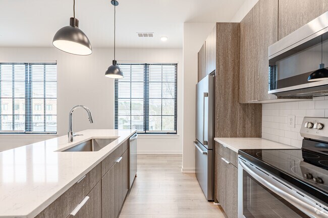 2BR, 2.5BA - 1,044SF - Kitchen - The Mill District