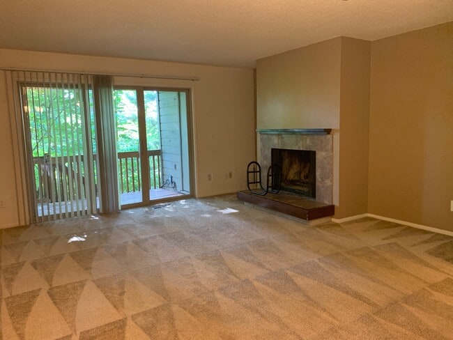 Peg Tree - Picturesque Living Area with Fireplace