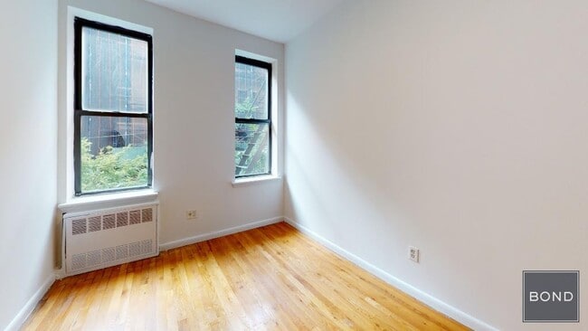 Building Photo - 417 E 65th St Unit 8 Rental