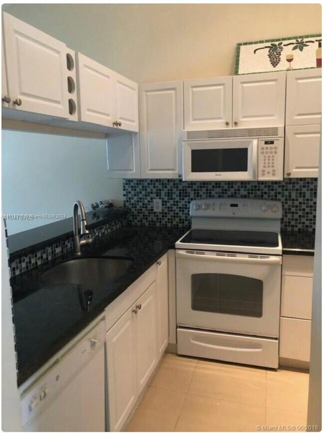 Photo - 939 Coral Club Dr Unit #939 GREAT 2 FLOORS ONE O