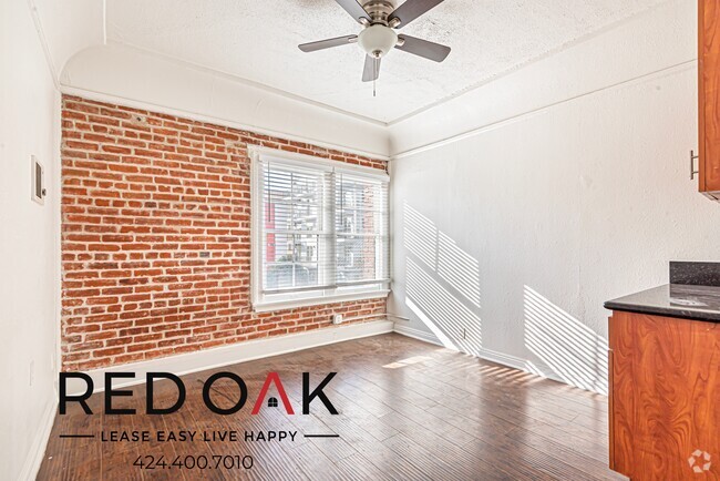 Building Photo - Stylish Studio with Exposed Red Brick, Min... Unit 203 Rental