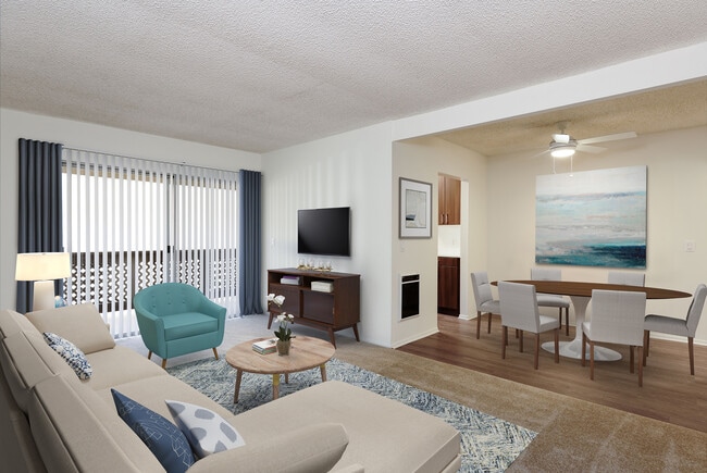 Renovated I kitchen and dining area with hard surface flooring and carpeted living area - eaves Huntington Beach