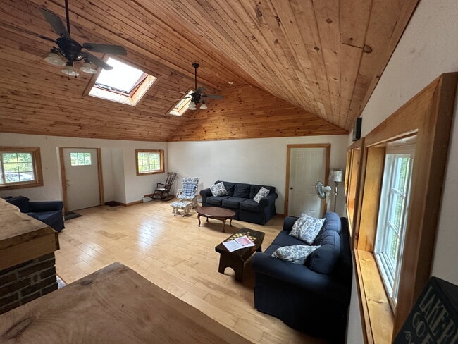 Charming 3BR Waterfront Retreat with Sunroom, Brick Accent & Scenic Lake Views