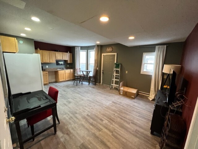 facing side door and kitchen from living area - 3040 Park Ave