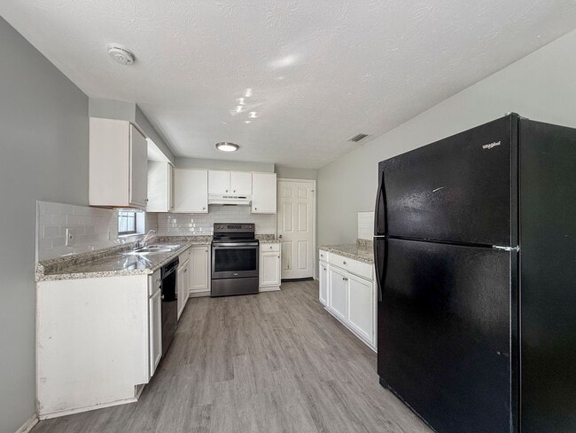 Photo - Renovated 4BR/2BA Pool Home in Jacksonville, FL | Fenced Yard | Pets Welcome