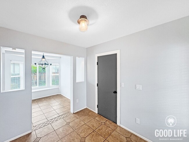 Photo - Inviting 2BD/1BA Gated Home in Vista with a 2 Car Garage, Private Yard & Community Amenities