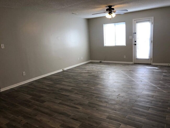 Photo - Charming 2BR Condo with Granite Countertops, Pool Access & Included Lawn Care