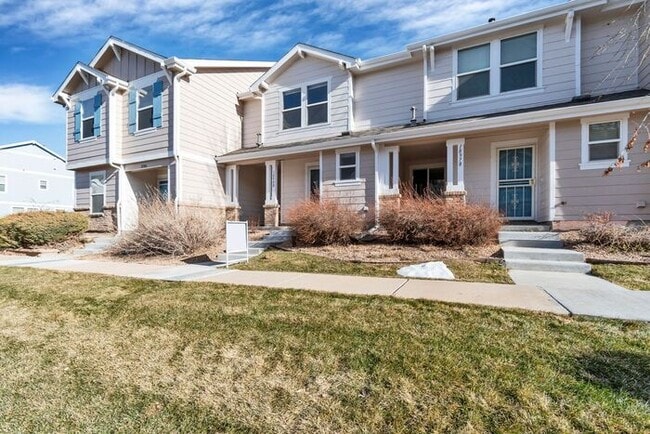 Building Photo - 3BR Townhome Near DIA & Light Rail | New Carpet, Garage & Fenced Patio