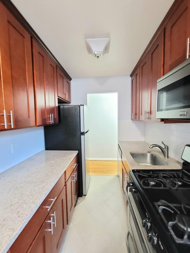 Galley Kitchen with Plenty Counter Space - 35 E Hartsdale Ave Apartments Unit 5F