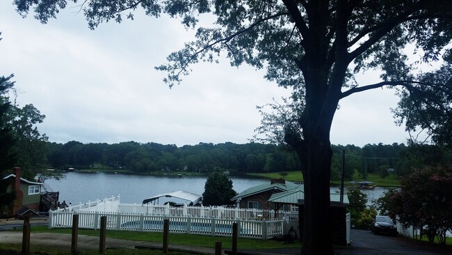 View from the camper, wooden posts in foreground will be removed when deck is built. - 106 Mountain Shore Dr House