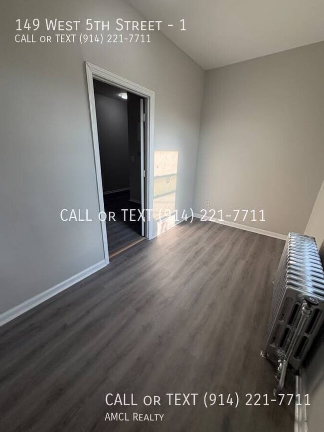 Building Photo - 149 W 5th St Unit 1