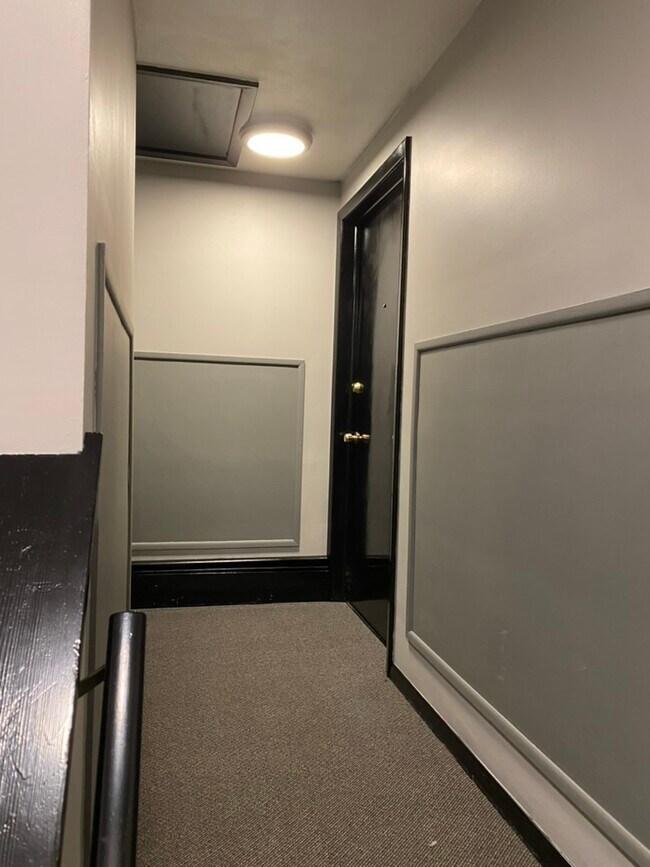 Newly painted and carpeted hallway - 6062 Transit Rd Unit 2