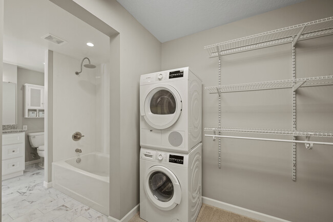 Walk-in closet with Bosch high efficient laundry