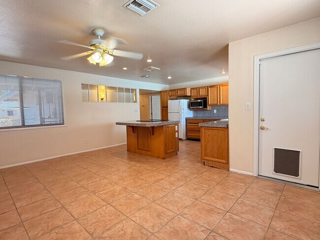 Photo - “Spacious 4-bedroom home with private pool in prime Tempe location!”