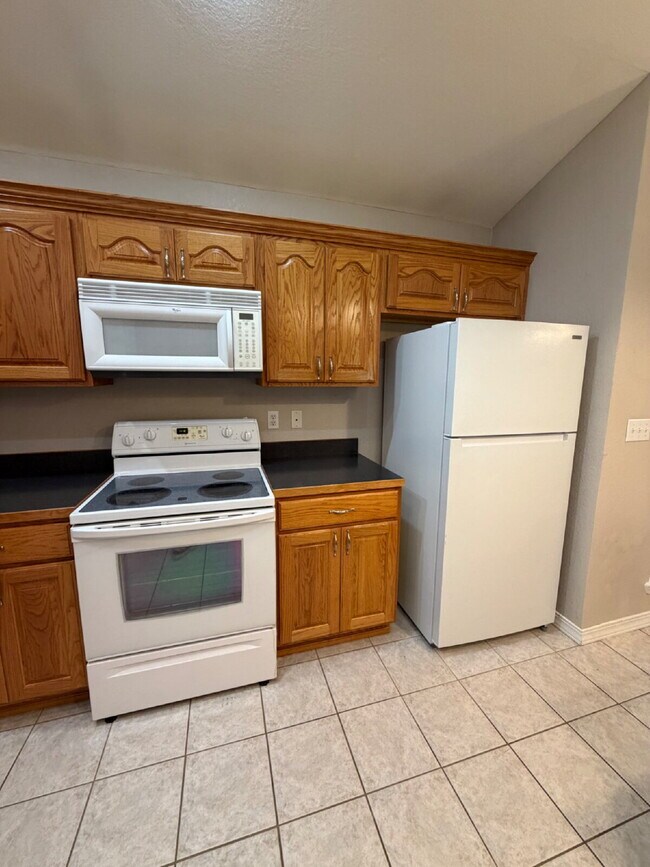 Photo - "Charming 3-Bedroom Summerbrooke home with 2 Full Baths with Fenced in, flat back yard”