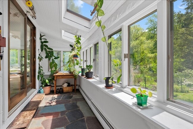 Photo - Stunning Updated Home with Private Pond Views in Chappaqua