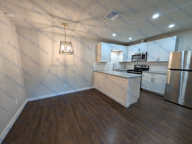 Dining area and kitchen - 1814 26th St W Unit 1816
