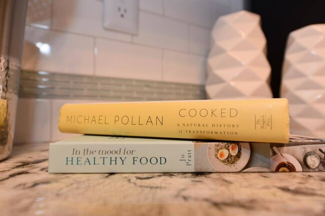 Kitchen decor- cook books on granite counters
