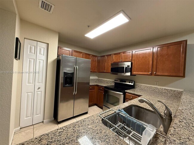 Building Photo - 11501 NW 89th St Unit 211 Rental