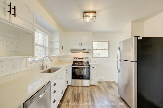 Photo - Evolve Real Estate: Welcome to This Spacious 5 Beds/2 Baths Single Family Residence With Great La...